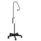 Black Welch Allyn mobile stand with an examination light. The stand has five wheels, a control pannel in the middle of the stand and a light at the top of it. Displayed against a white background.