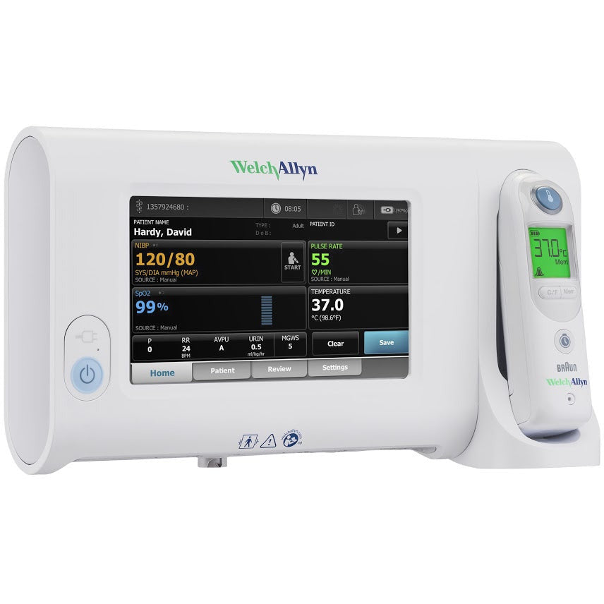 Welch Allyn Connex Spot Monitor with a black screen showing a patients vitals, a power button to the left of the screen and a holder on the right hand side with a Braun Welch Allyn Pro 6000 Ear Thermometer. The Welch Allyn Logo is printed across the top of the monitor as well as on the bottom of the thermometer below the Braun logo. The monitor is displayed against a white background.