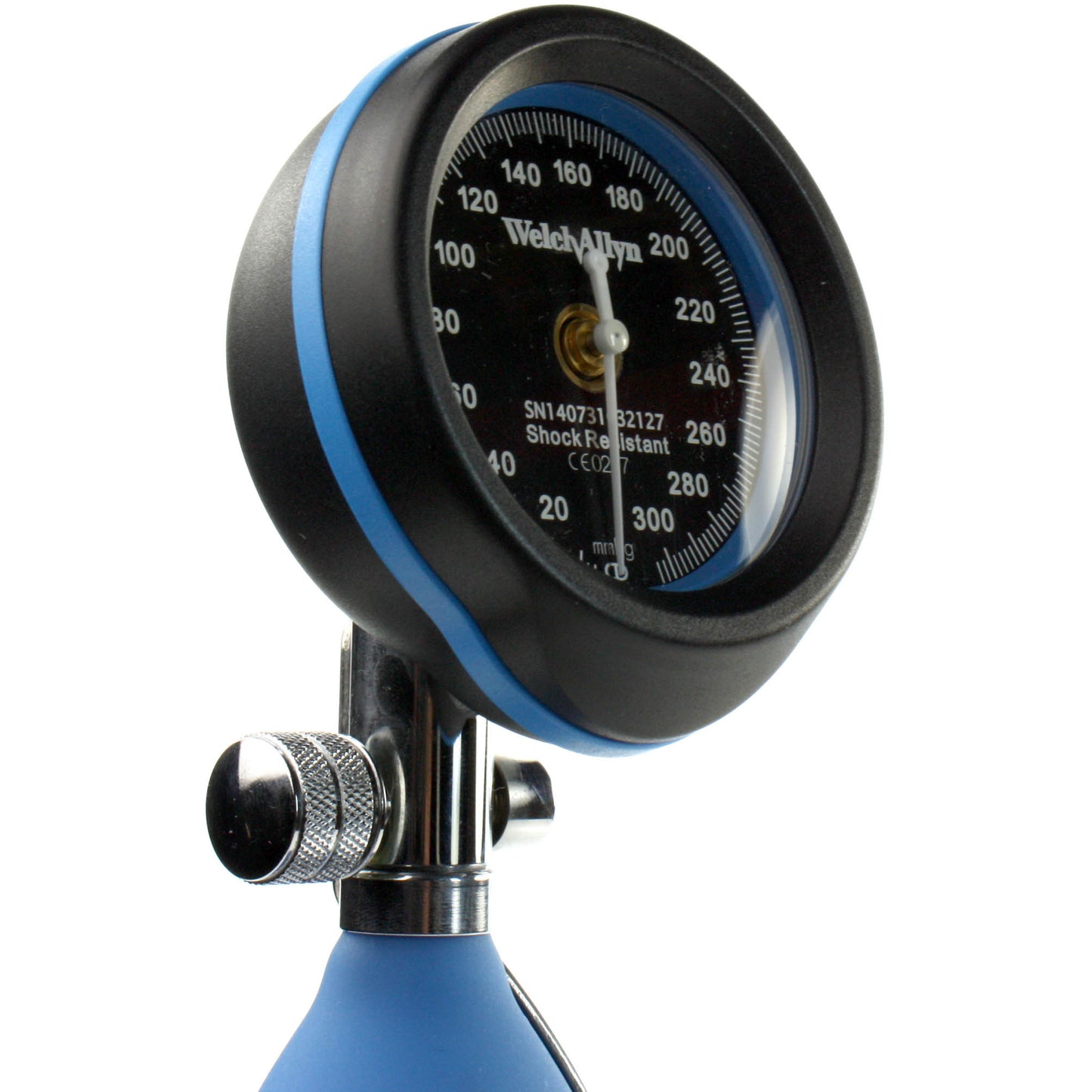 Dial of the blue Welch Allyn DuraShock DS55 Sphygmomanometer with the Welch Allyn logo written in white on the black face of the dial. Displayed against a white background.