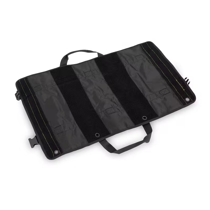 A black Elite Bags TRIA modular panel with multiple vertical slots, two top handles, and a side buckle strap, shown on a plain white background.